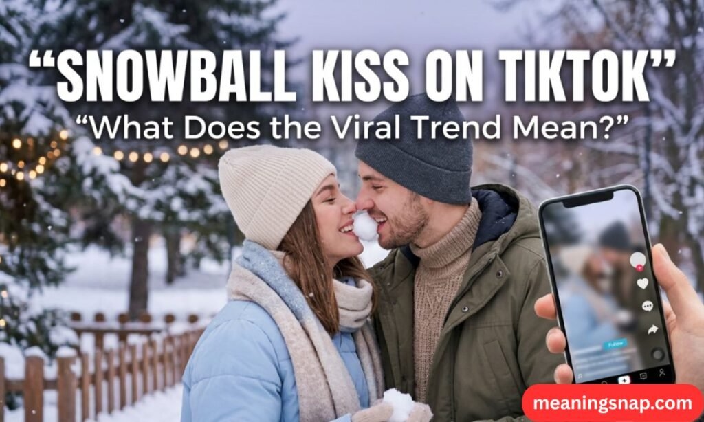 Couple sharing a snowball kiss in a snowy park next to smartphone screen recording the viral TikTok trend.