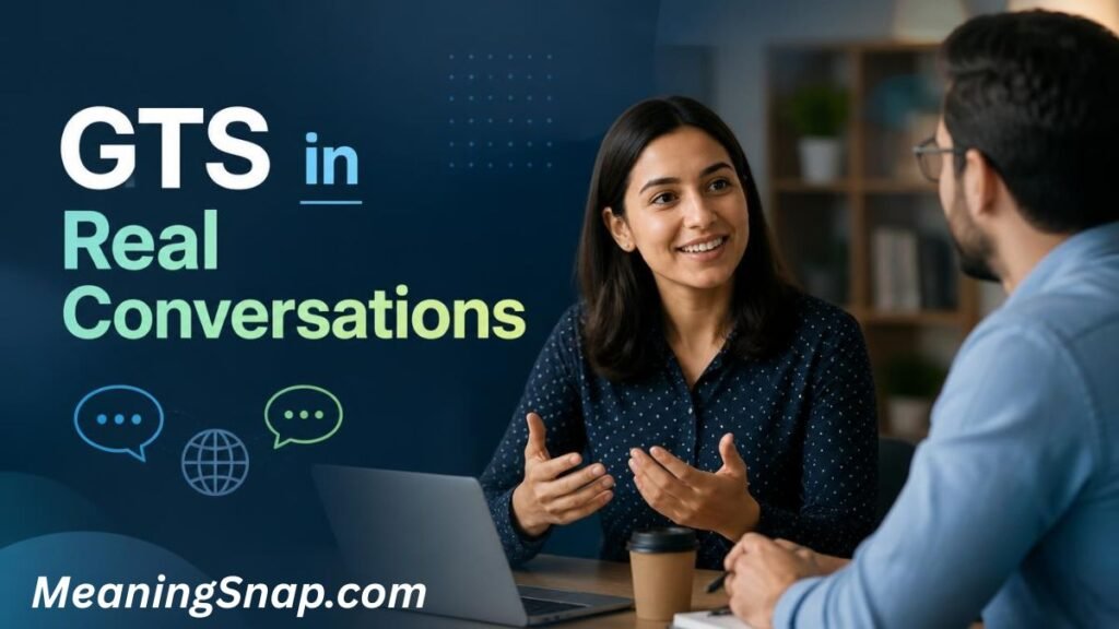 Two colleagues conversing over a desk with a laptop alongside text reading "GTS in Real Conversations."