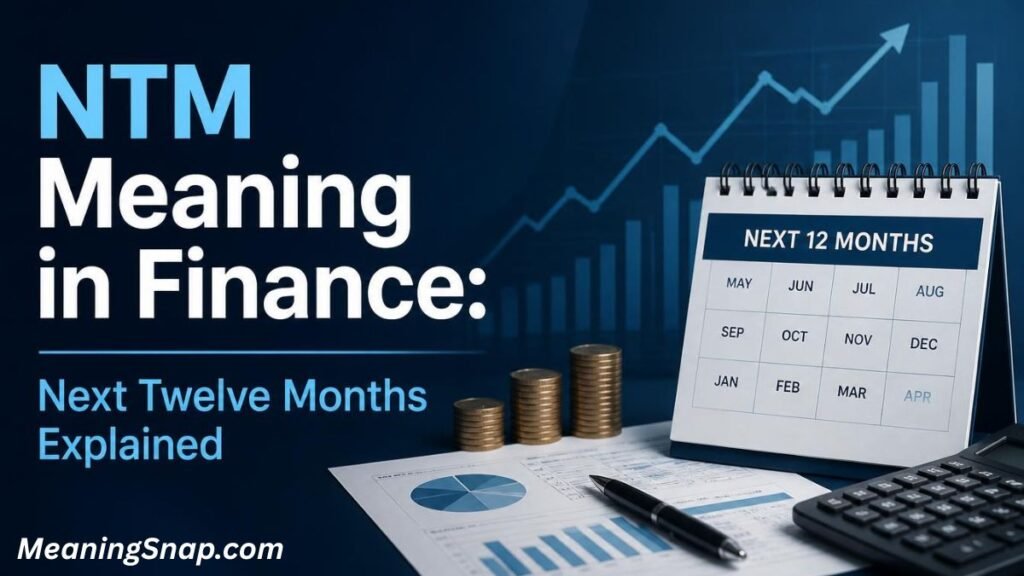 Desk setup featuring a calendar displaying "Next 12 Months," stacked coins, and charts beside text reading "NTM Meaning in Finance."